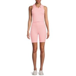 Pink tank top and bike shorts.